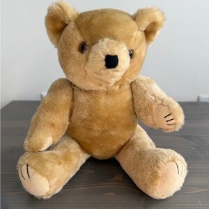 Vintage jointed stuffed teddy bear